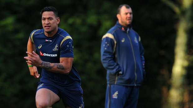 Israel Folau, left, has given Michael Cheika his seal of approval as Wallabies coach.