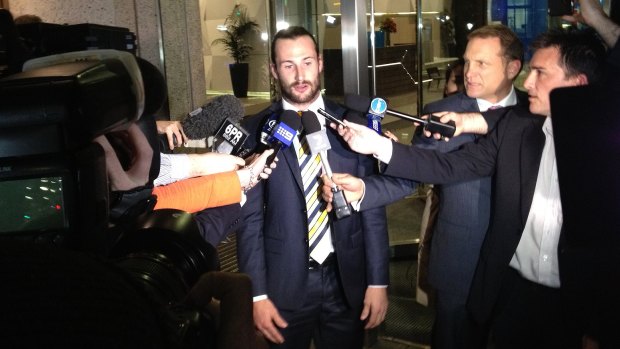 Chris Masten faces the media after being suspended four two weeks for biting.