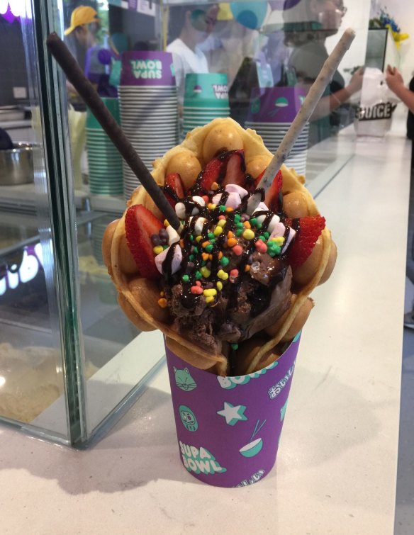 The egg puffle dessert, loaded up with toppings, at Supa Bowl in Canberra's No Name Lane.