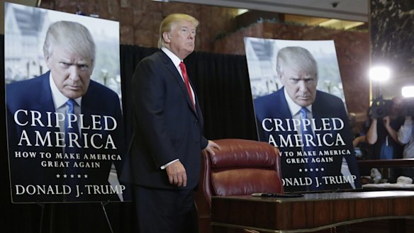 Republican presidential candidate Donald Trump arrives to autograph copies of his new book.