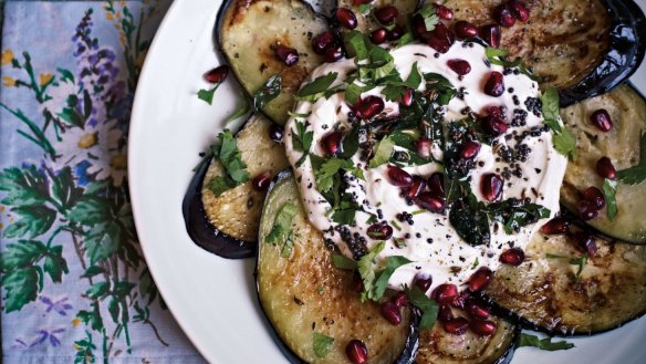 Crisp eggplants with sweet spiced yoghurt and pomegranates.