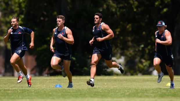 On the run: The Waratahs train at Moore Park on Wednesday.