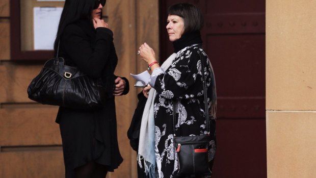 Deidree Huxley, right, the mother of murdered man Morgan Huxley, with a family friend at Darlinghurst court in Sydney.