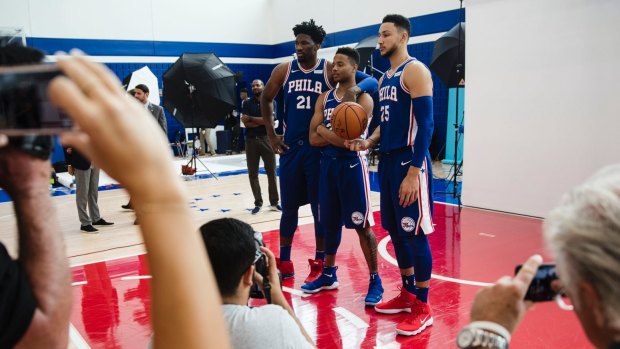 From left: Philadelphia 76ers' Joel Embiid, Markelle Fultz, and Ben Simmons pose at the side's media day.
