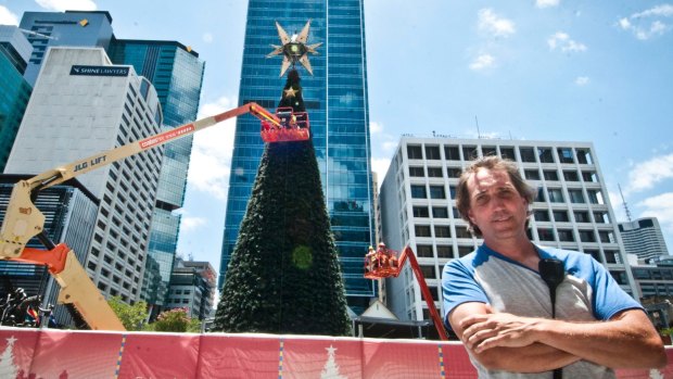 Engineer Adam Cole oversees the set up of the Lord Mayor's Christmas tree.