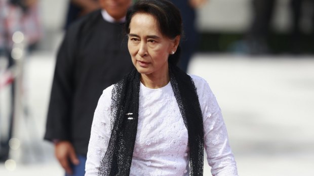 Myanmar's pro-democracy leader Aung San Suu Kyi attends an event marking the anniversary of Martyrs' Day at the Martyrs' Mausoleum in Yangon in July.