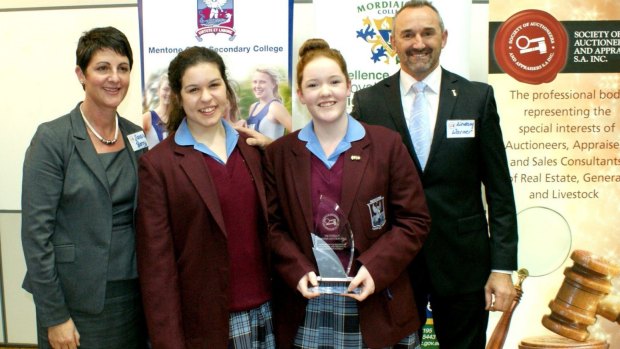 Sold: Tori Baranov, with trophy, and Alex Mallis competed in the Victorian round of the Auction Idol competition. They are pictured with Lindsay Warner, organiser of the competition and auctioneer and coach  Sandra Berry.