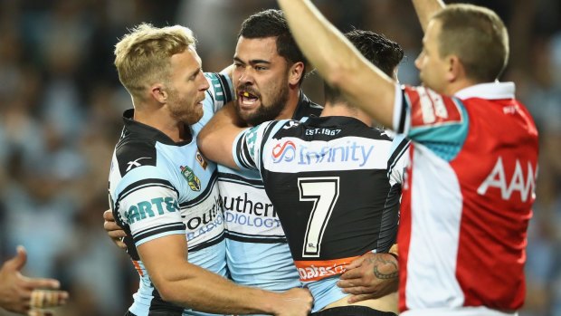 "I want to make history": Matt Prior and Chad Townsend celebrate with Andrew Fifita on Friday night.