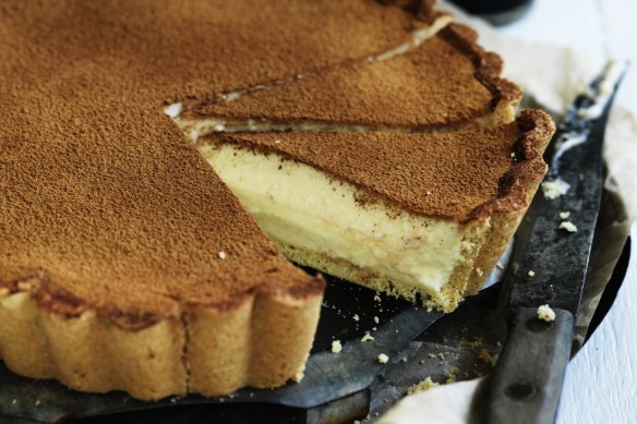 This milky custard tart is dusted with cinnamon.