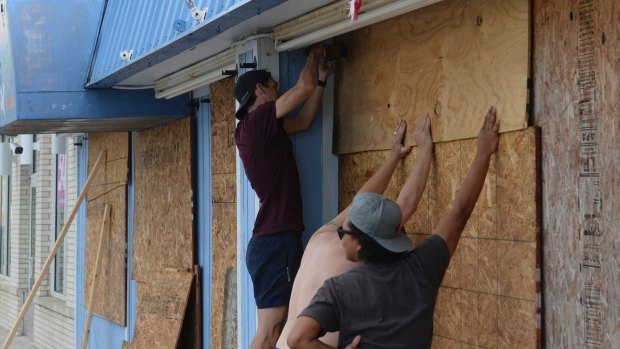 Boarding up: A local business in the US state Georgia prepares for possible impact of Hurricane Irma.