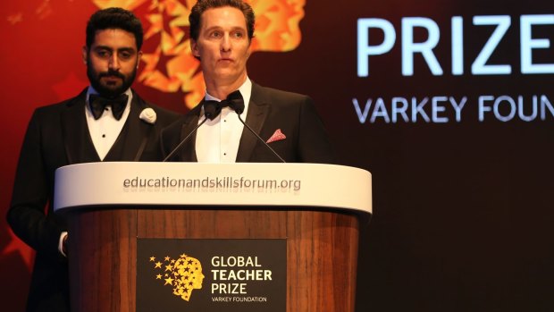 Actor Matthew McConaughey, right, stands next to Bollywood actor Abhishek Bachchan at the ceremony awarding the Global Teacher Prize, in Dubai on Sunday.