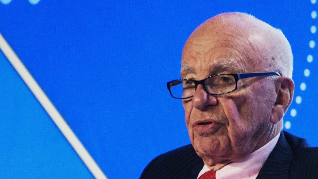 "See you next year I hope.": Rupert Murdoch faced a shareholder revolt at the News Corp AGM.
