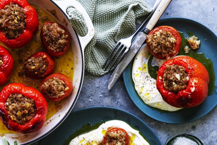 Karen Martini's baked tomatoes and capsicums with rice, dried mint and haloumi.