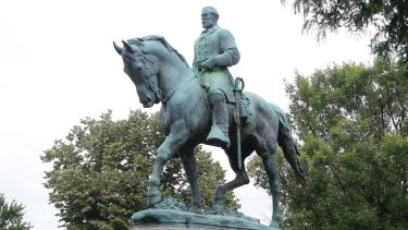 The statue of Confederate General Robert E. Lee still stands in Lee Park in Charlottesville.