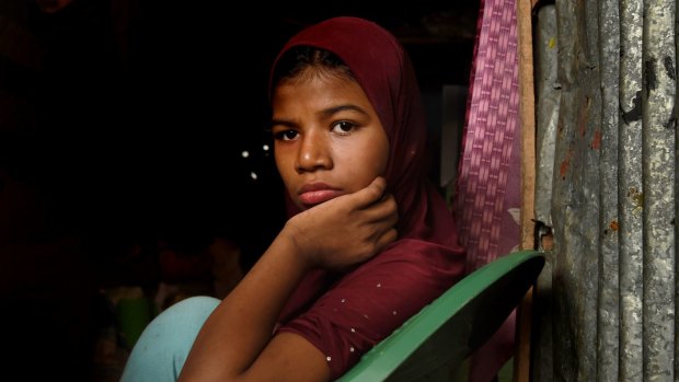 Sumiya Begum, 12, was injured in a machete attack in Myanmar five years ago and has not spoken since. Her father was killed by Myanmar police.