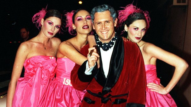 Game show host Larry Emdur channelled Hugh Hefner, turning up with a bevy of his 