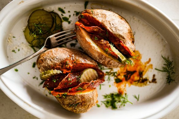 Baked potatoes with Bloody Mary butter, pickles and bacon.