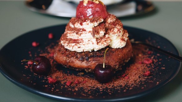 French toast with cherry compote, chantilly cream, fresh cherries, dark chocolate cream and cherry sorbet.