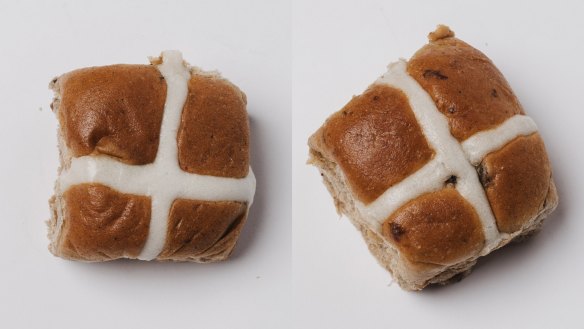 Hot cross buns from Aldi (left) and Woolworths.