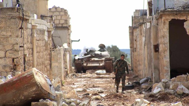 A soldier loyal to Syria's President Bashar al-Assad in Bashkoy village, north of Aleppo, on Wednesday. 