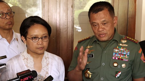 Indonesian Armed Forces Chief General Gatot Nurmantyo, right, speaks to the media as Foreign Minister Retno Marsudi, second left, listens in 2016.
