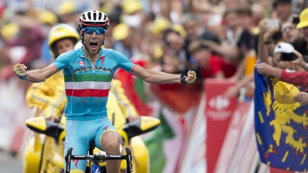 Back in the winner's circle: Italy's Vincenzo Nibali celebrates victory on stage 19.