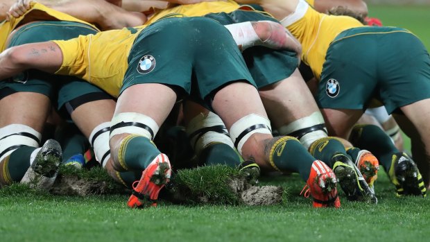 AAMI Park pitch is churned up during a scrum when the Wallabies played England.