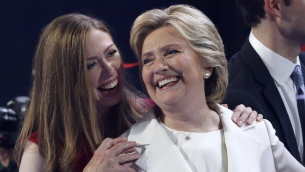Chelsea Clinton shares a moment on stage with her mother Hillary Clinton during the final day of the Democratic National Convention.