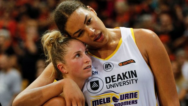 Liz Cambage and Rebecca Cole console each other after the grand final loss.
