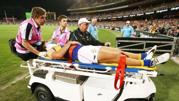 Andrew Gaff is stretchered off.