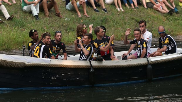 Team MTN Qhubeka arrives by canal boat for the team presentation ahead of the 2015 Tour de France.