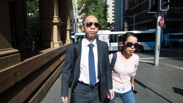 Robert Xie with his wife Kathy Lin during the final days of his fourth trial.