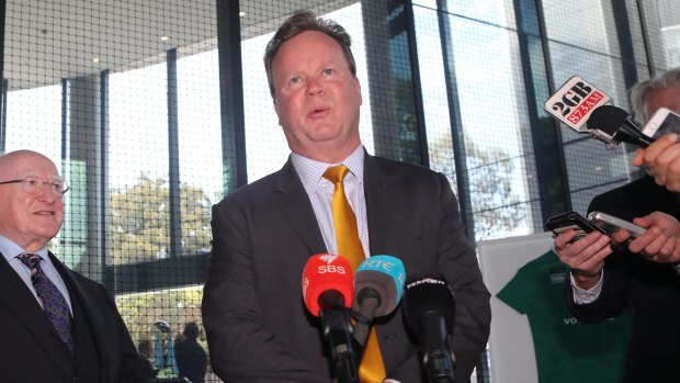 Still in place: Bill Pulver addresses the media outside the old ARU headquarters.