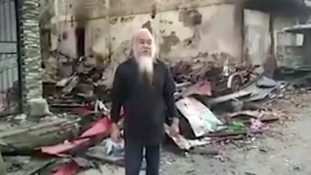 Father Teresito Suganob in a militant's video.