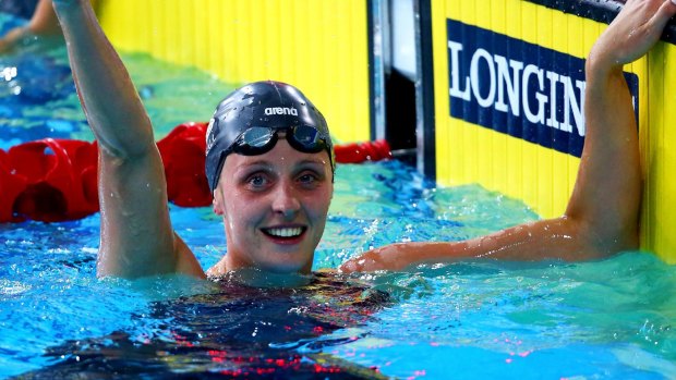 Francesca Halsall of England gives the thumbs up after setting a new  Commonwealth Games record in the final.