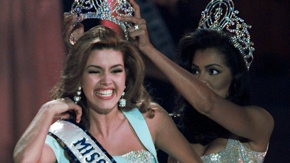 Alicia Machado is crowned Miss Universe.