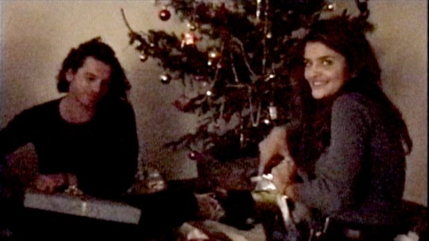 A screen grab from a Hutchence home movie of Michael with model Helena Christensen at his French villa.