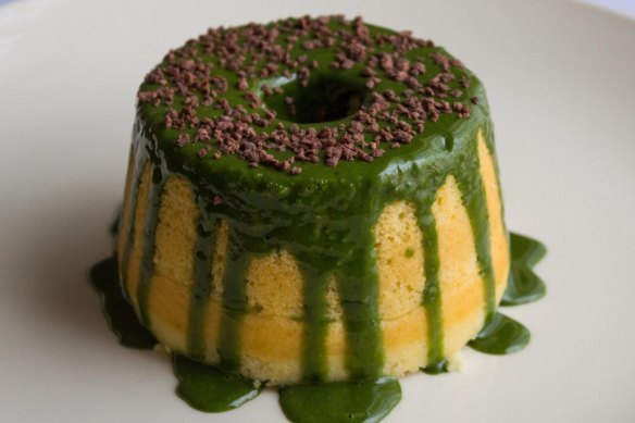 Vanilla cake drizzled with matcha glaze.