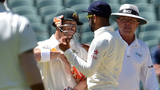 India's Virat Kohli  and Australia's David Warner exchange words.