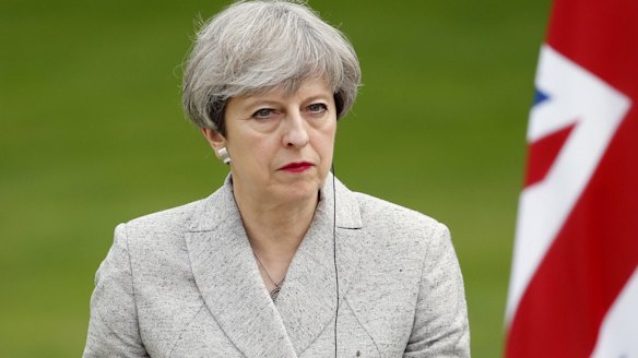 Saddened: British Prime Minister Theresa May.