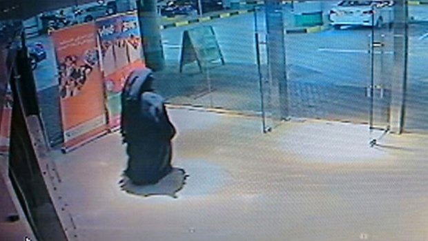 An image from video released by the Abu Dhabi police department in December last year shows a veiled suspect in the stabbing of an American teacher in a shopping mall restroom as seen on security camera footage in Abu Dhabi