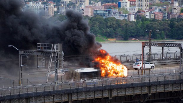 Traffic chaos on the Sydney Harbour Bridge as a Sydney Bus catches fire.