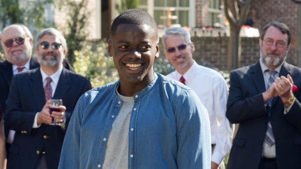 Chris (Daniel Kaluuya) was right to be worried as weird rich white people gather for a party in <i>Get Out</I>.
