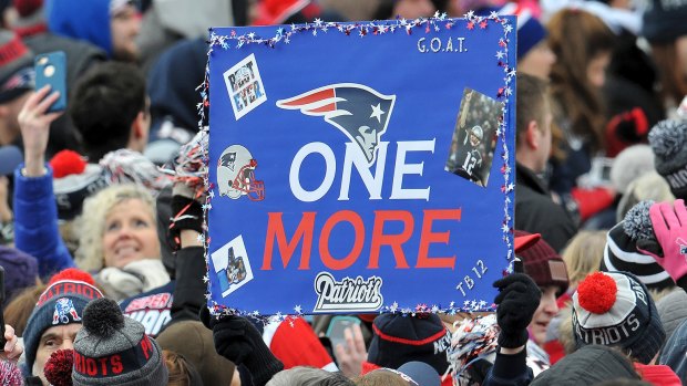 One more time: Patriots fans ready themselves for another ring.
