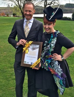 Nathan Harris and Mel O'Brien, founders of the Three Sixty Fashion Markets, with their Keep Australia Beautiful award at Government House.