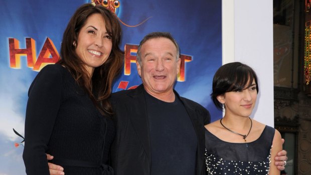 Robin with his wife, Susan, and daughter, Zelda Williams at the  premiere of <i>Happy Feet Two</i> in 2011. 