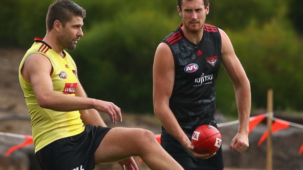 Seventh signing: Bombers ruckman Mark Jamar (left) during training.