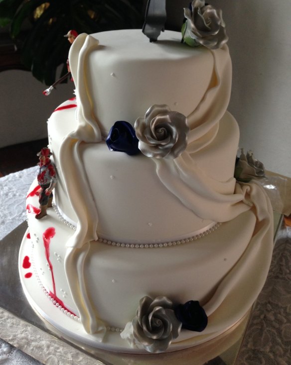  The zombie wedding cake looked more traditional on one side, and more bloody and gruesome on the other. 