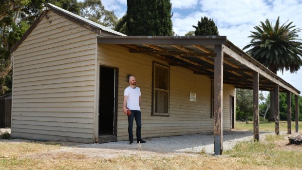 Artist Shane McGrath at the rooms of the old Cocoroc football club. Melbourne Water has renovated the ground in preparation for his work, On the Outer.