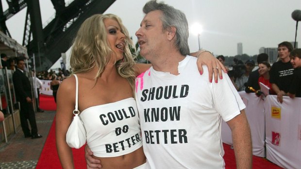 Courtney Act and Ian Dickson arrive at the inaugural MTV Australia awards at Sydney's Luna Park in 2005.